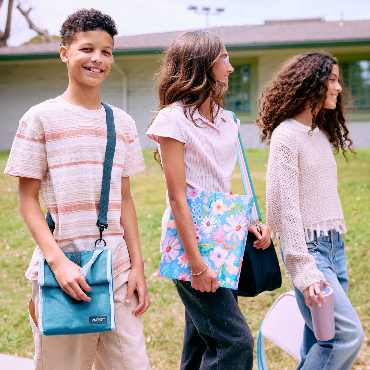 freezable-houston-lunch-bag-l4 freezable-houston-lunch-bag-agave-lifestyle-walking-to-school.jpg